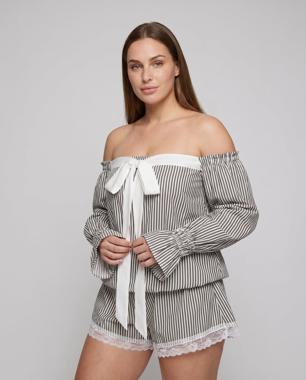 Women's Off-Shoulder Blouse Shirt with Ruffle Details and Bow Accent - upper body view