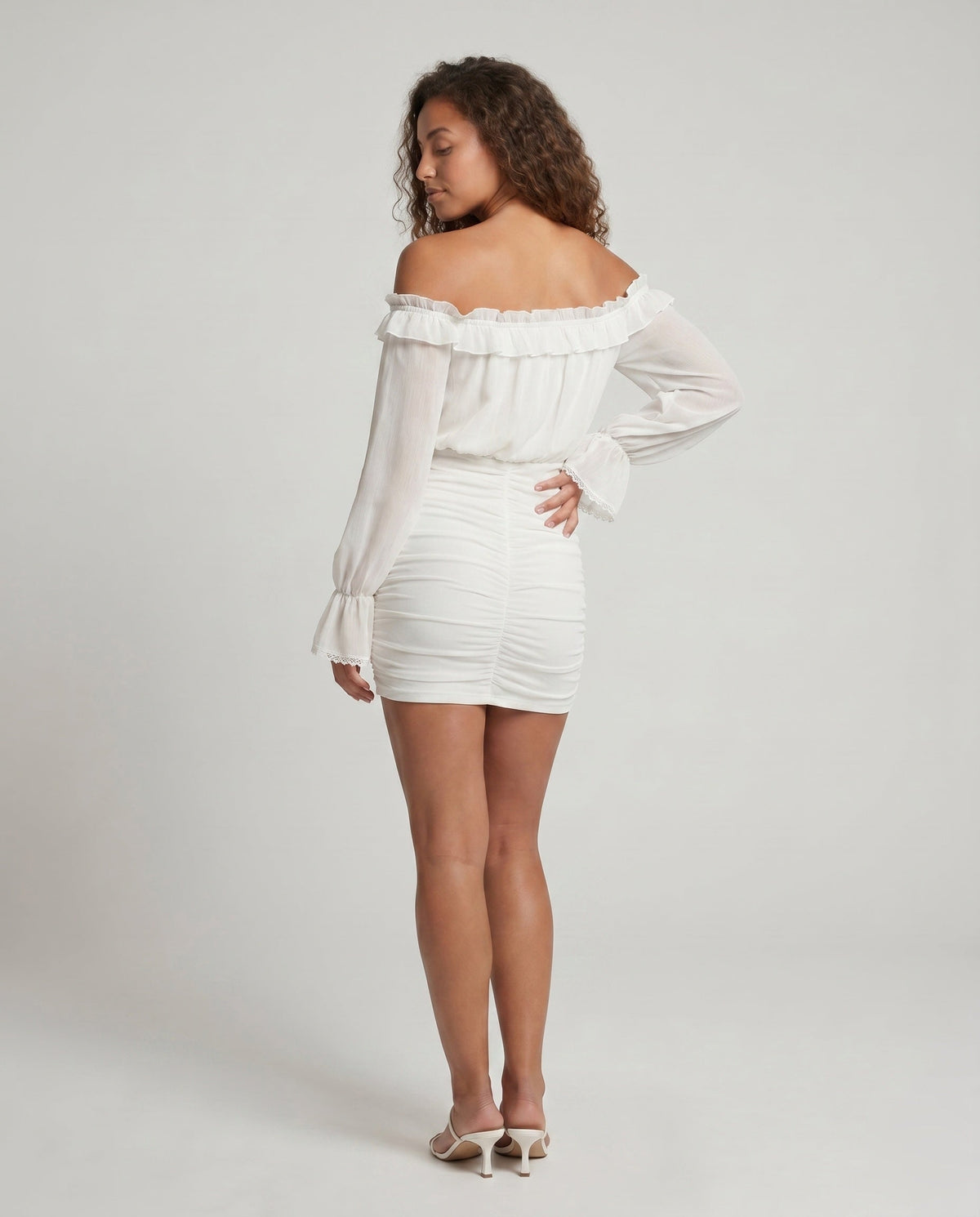 Women's Off-Shoulder Mini Dress with Voluminous Ruffles and Elegant Cut - back view