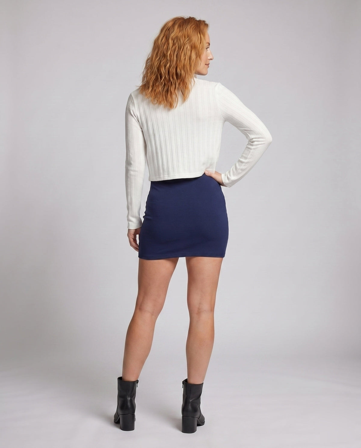 Women's set of two pieces with elegant top and figure-hugging dress - back view