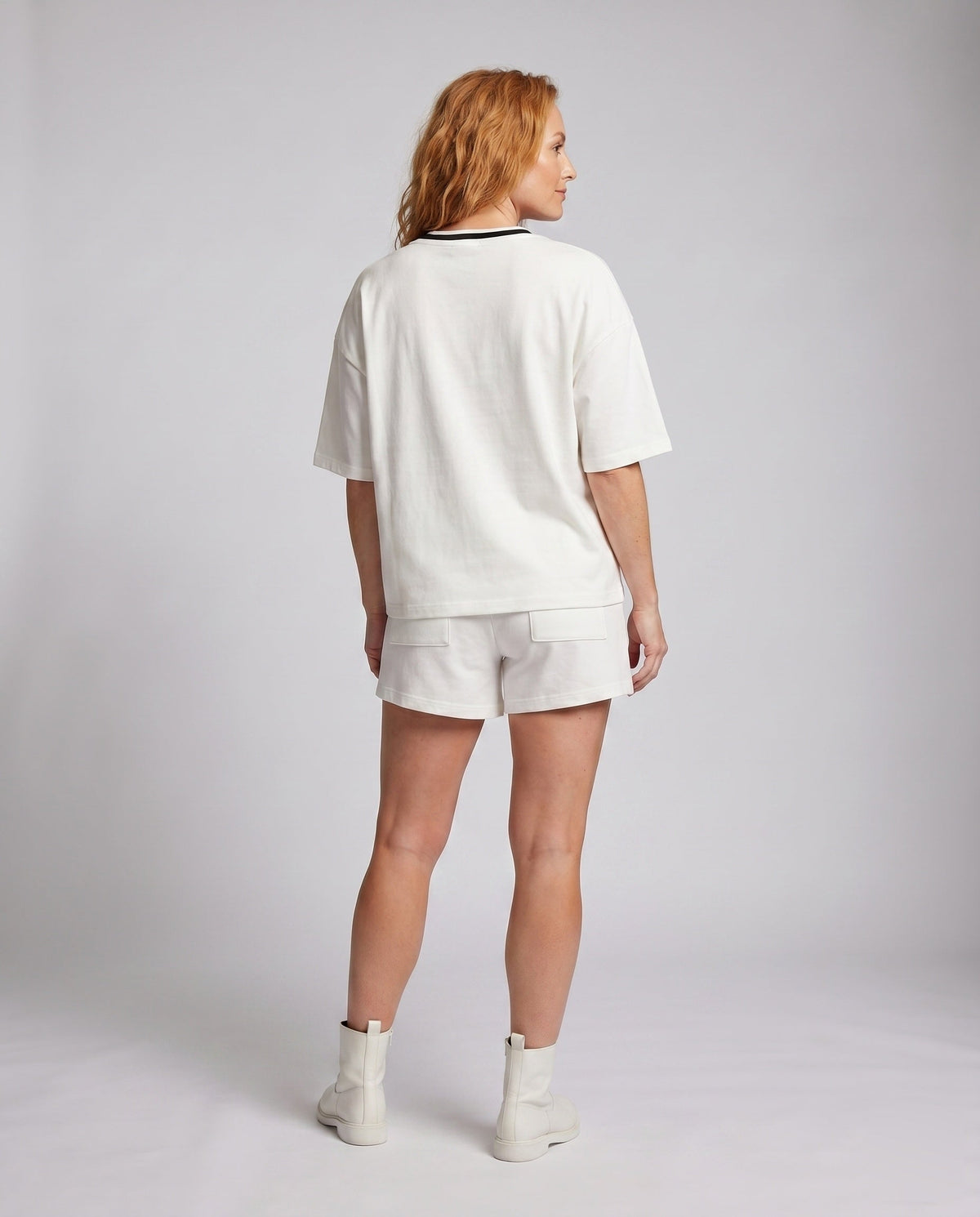 Women's sporty casual set with loose oversized T-shirt and shorts - back view