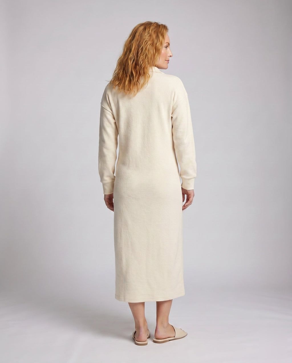 Women’s sporty long sleeve dress with high collar and short zipper - back view