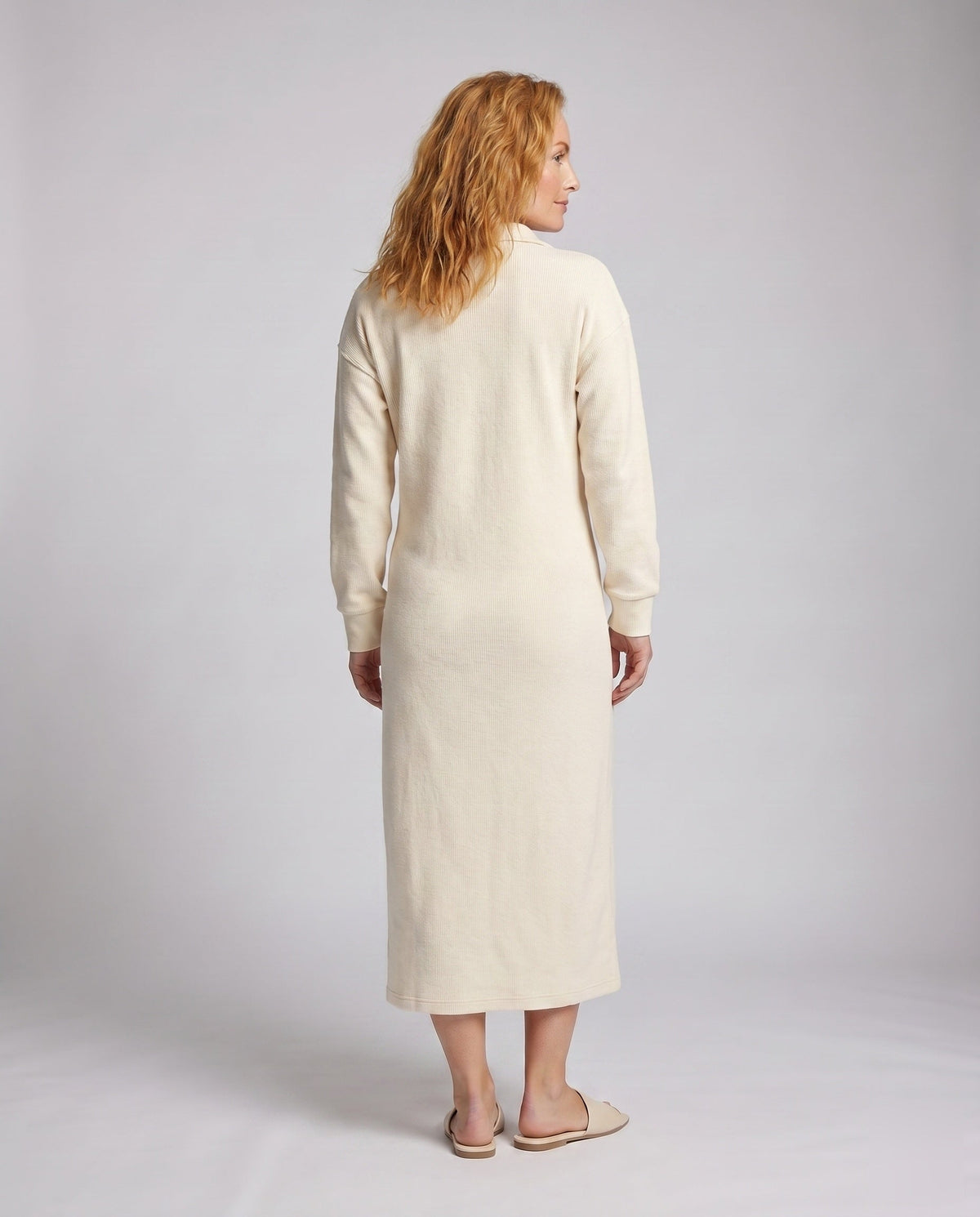 Women’s sporty long sleeve dress with high collar and short zipper - back view