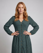Women's blouse dress with elegant button details and high waist cut - upper body view