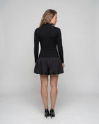 Women's dress with high collar and voluminous hem - back view