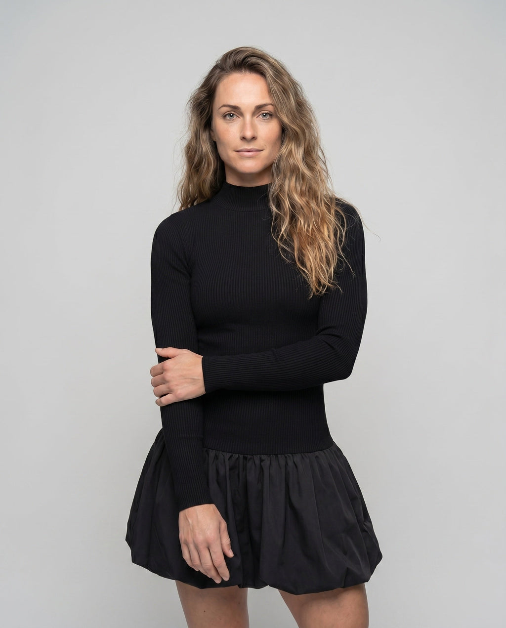 Women's dress with high collar and voluminous hem - upper body view