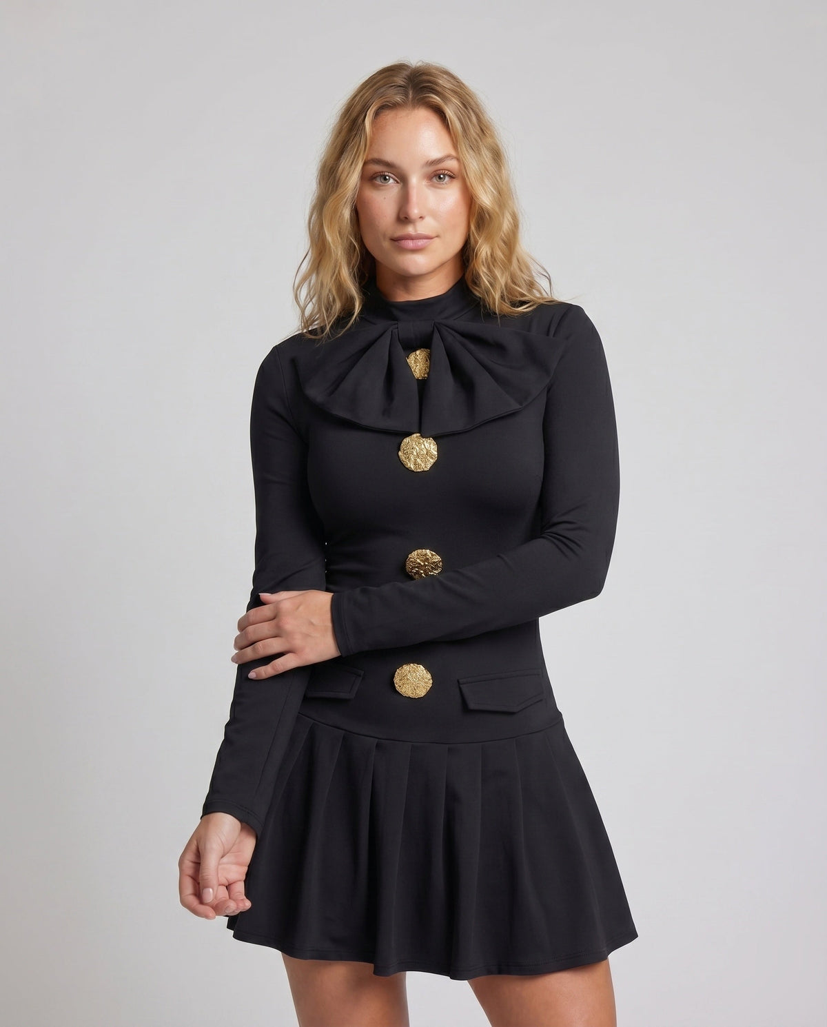 Women's short-sleeve dress with elegant bow tie and golden button details - upper body view