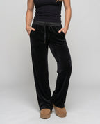 Women's casual and elegant velour pants with wide leg - lower body view