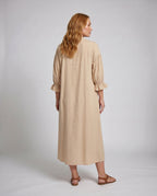 Women's maxi dress with elegant pleats and button placket - back view