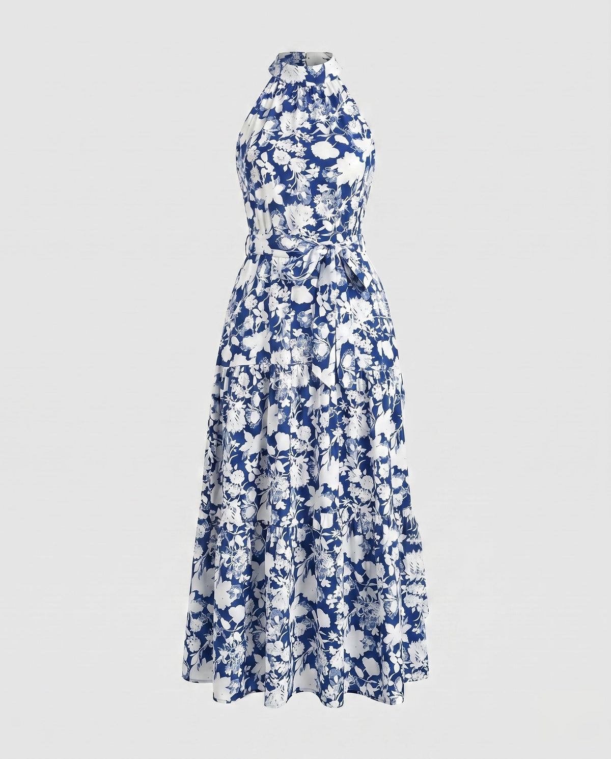 Women's maxi dress with elegant floral design and fitted belt - product shot