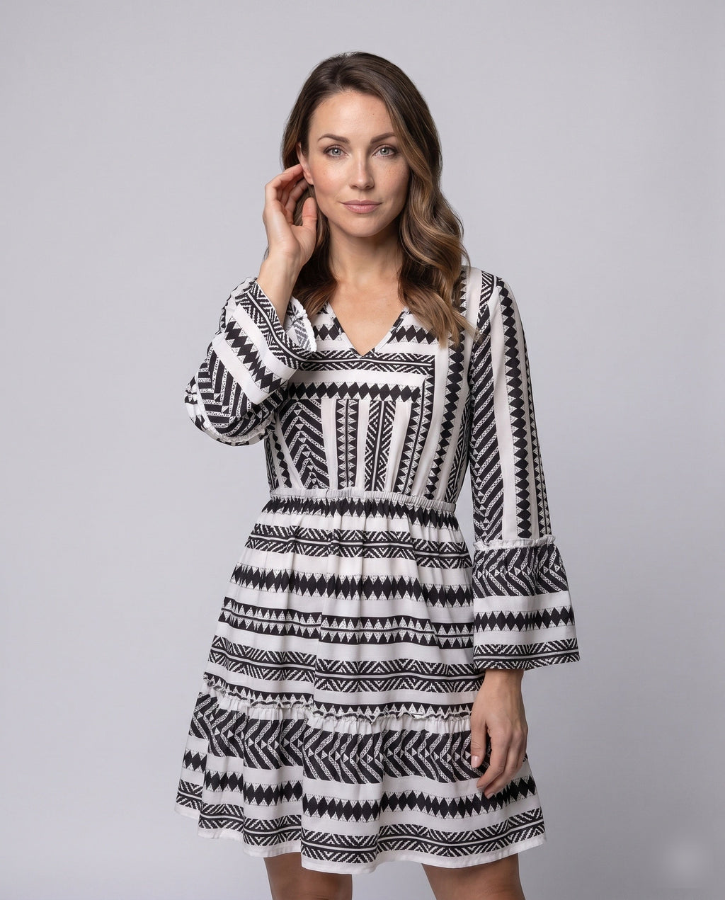 Women’s midi dress with eye-catching geometric pattern and V-neck - upper body view
