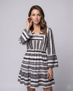 Women’s midi dress with eye-catching geometric pattern and V-neck - upper body view