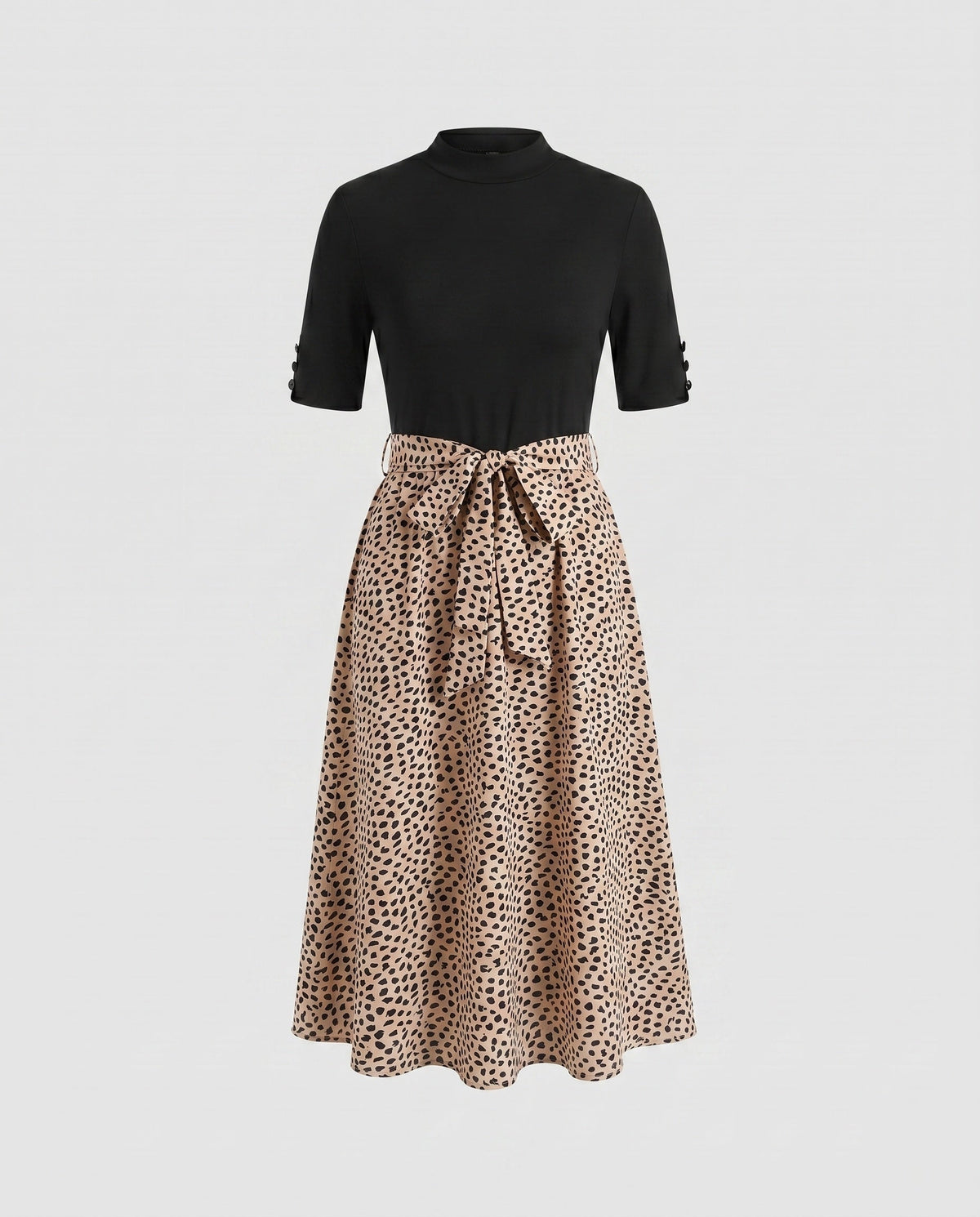 Ladies midi dress with elegant tie belt and fashionable polka dot pattern - product shot