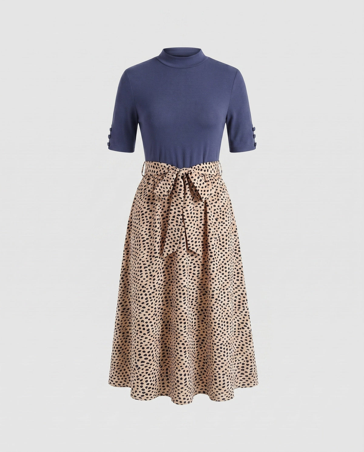 Ladies midi dress with elegant tie belt and fashionable polka dot pattern - product shot