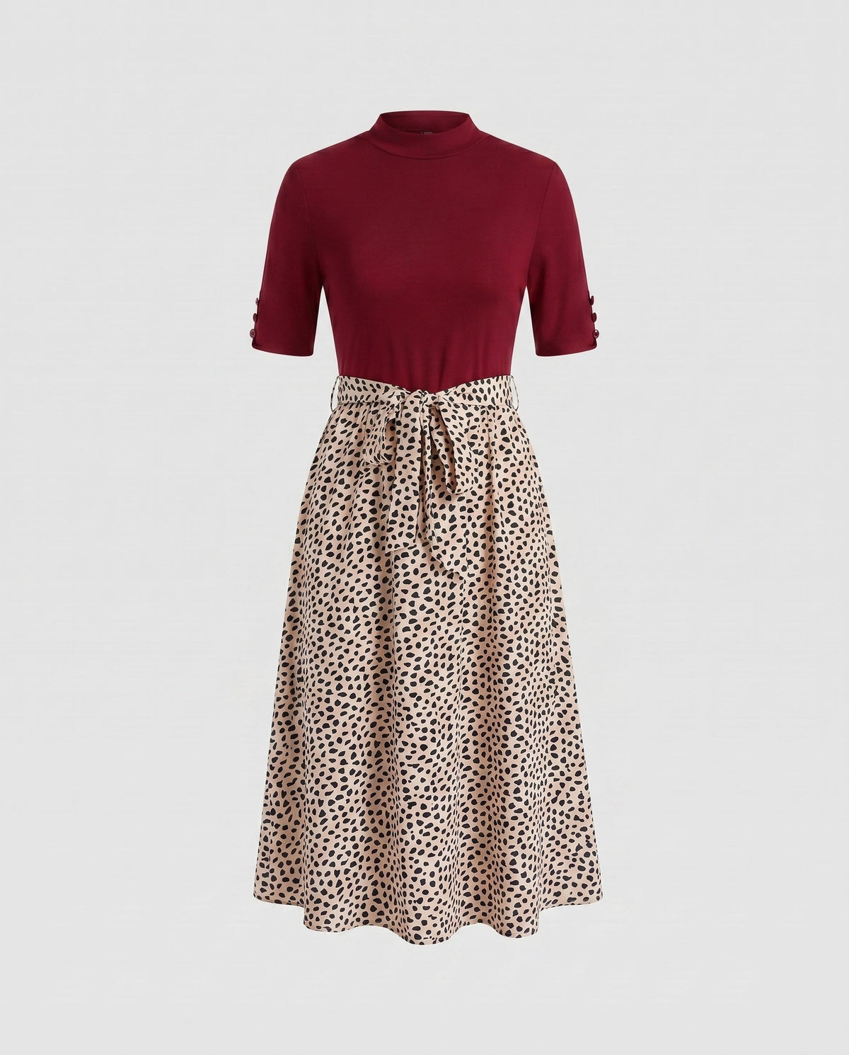 Ladies midi dress with elegant tie belt and fashionable polka dot pattern - product shot