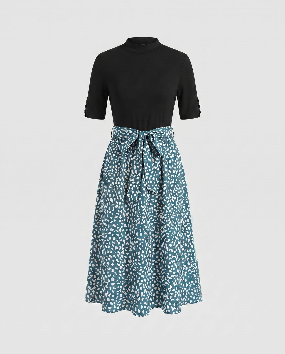 Ladies midi dress with elegant tie belt and fashionable polka dot pattern - product shot