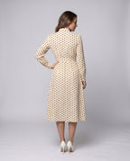 Women's midi dress with elegant bow collar and playful dots - back view