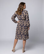 Women’s midi dress with elegant V-neck and trendy tie belt - back view