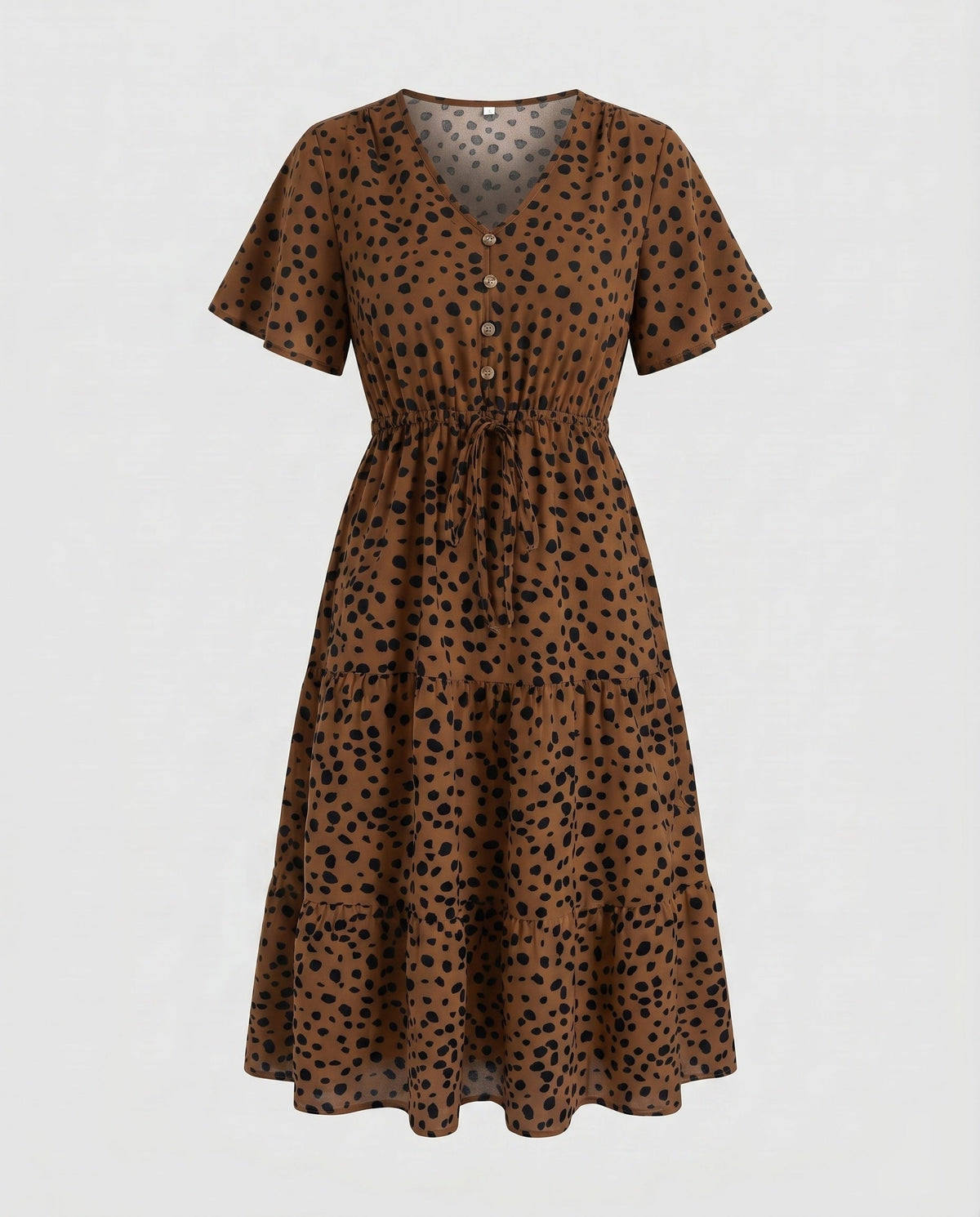 Women’s midi dress with flowing skirt and decorative polka dot pattern - product shot