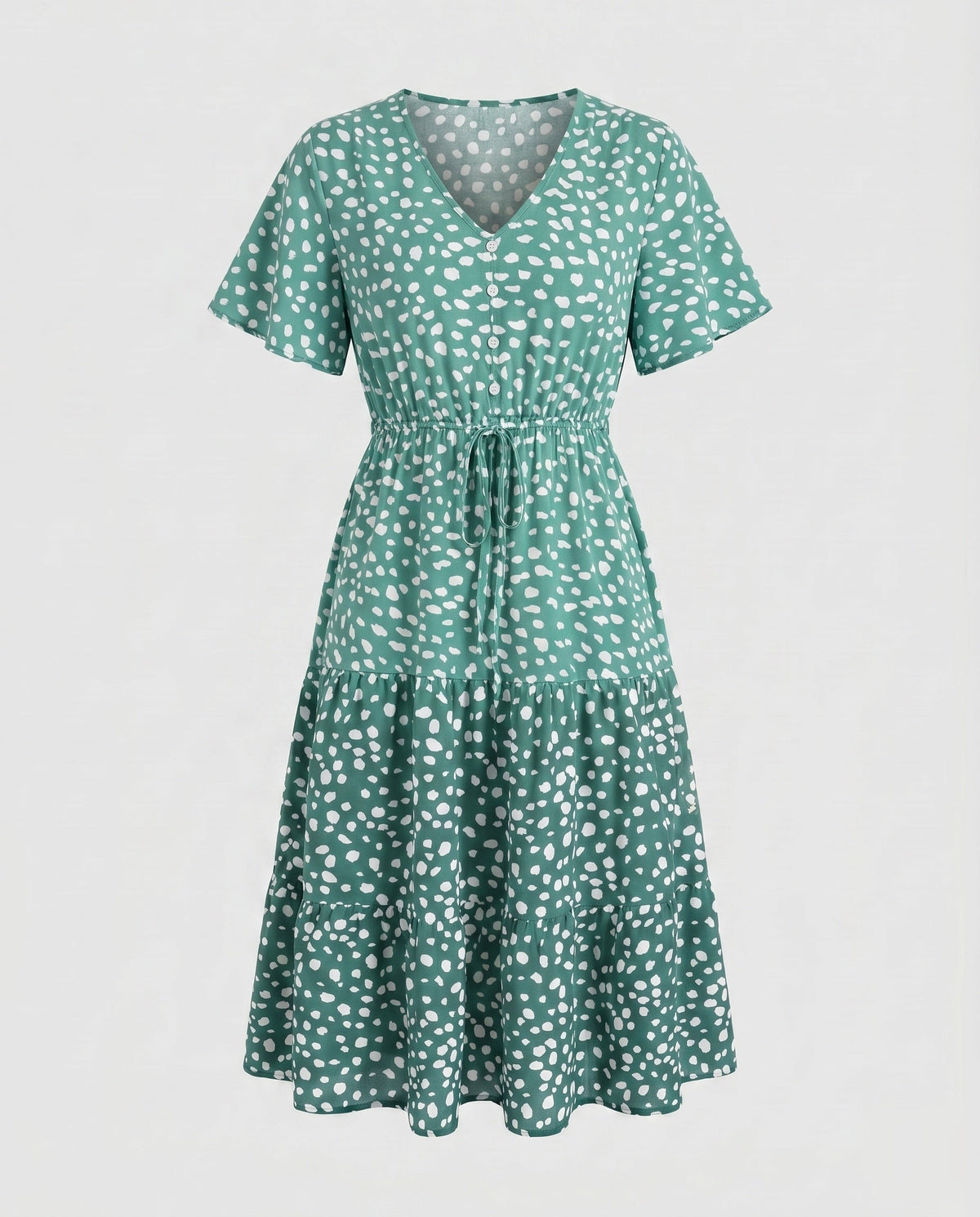 Women’s midi dress with flowing skirt and decorative polka dot pattern - product shot