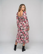 Women's midi dress with floral design and chic slit - back view