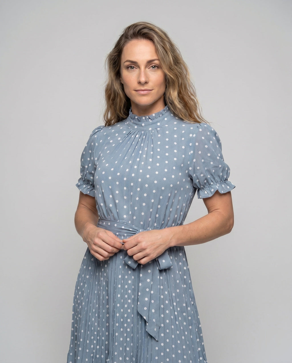 Women's midi dress with ruffle details and fitted belt - upper body view