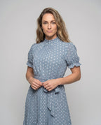 Women's midi dress with ruffle details and fitted belt - upper body view