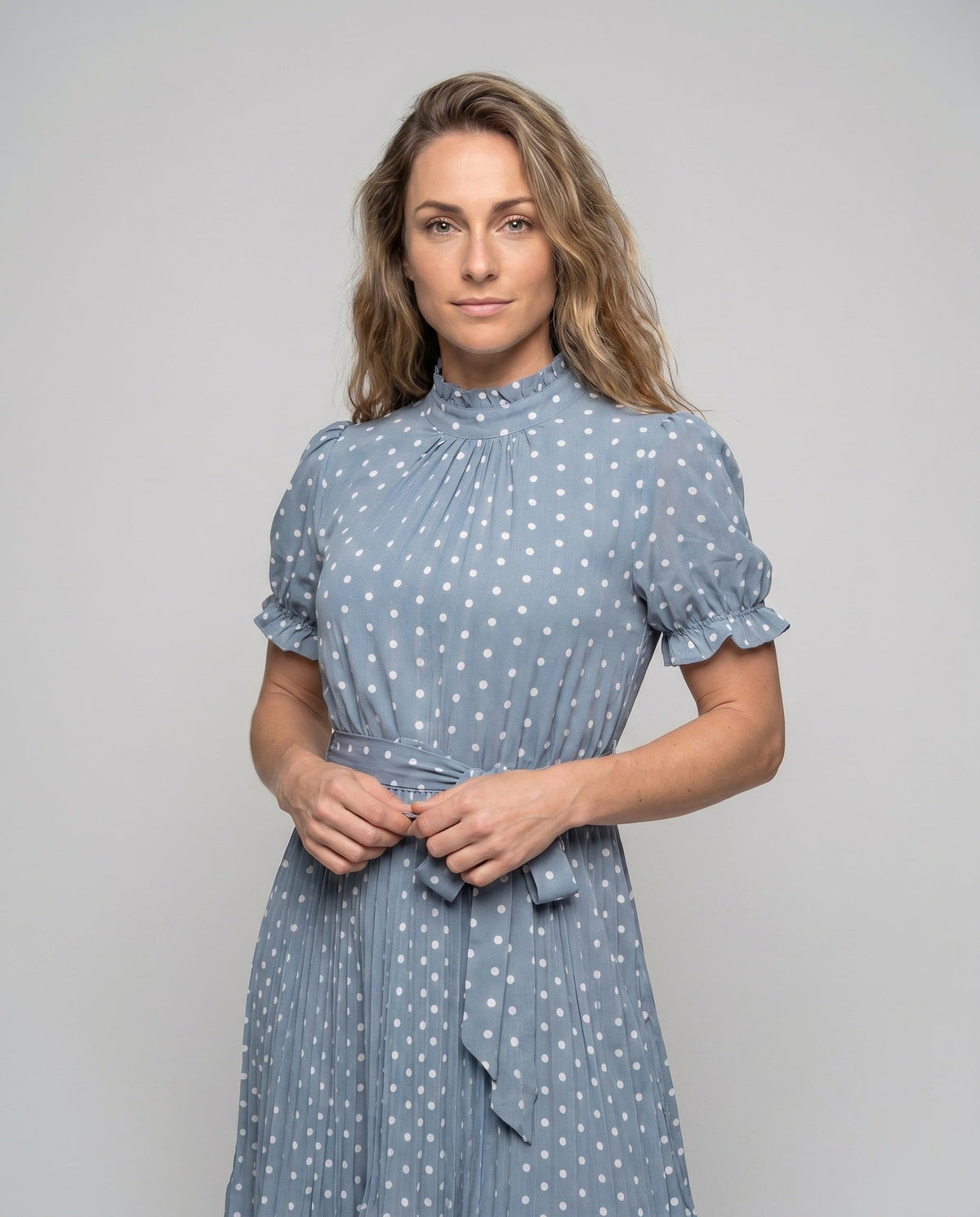 Women's midi dress with ruffle details and fitted belt - upper body view