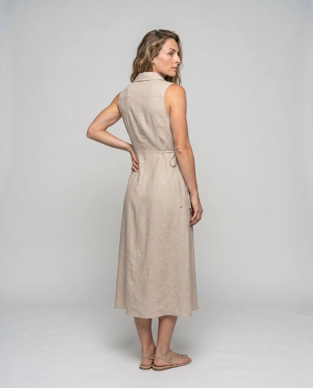 Women’s midi dress with a tailored fit and stylish button details - back view