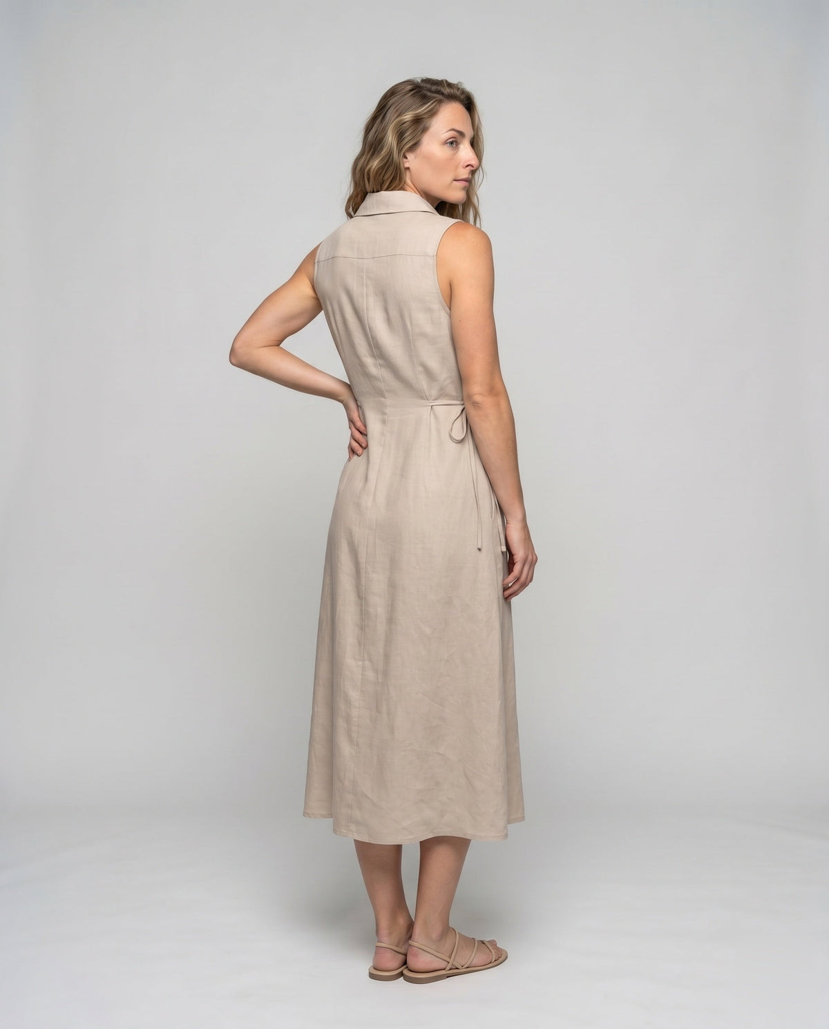 Women’s midi dress with a tailored fit and stylish button details - back view