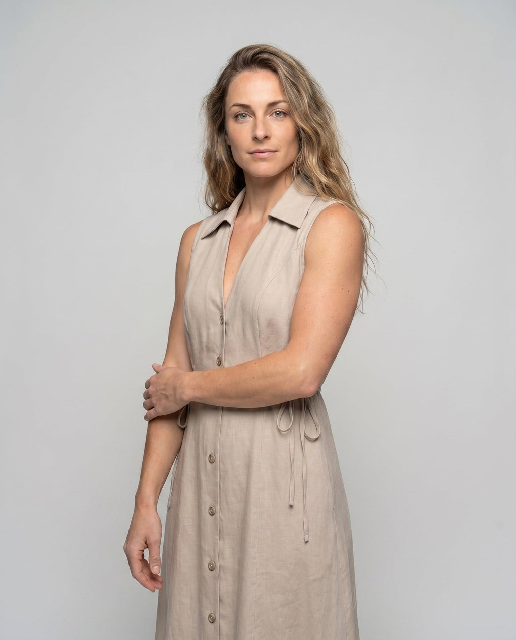 Women’s midi dress with a tailored fit and stylish button details - upper body view