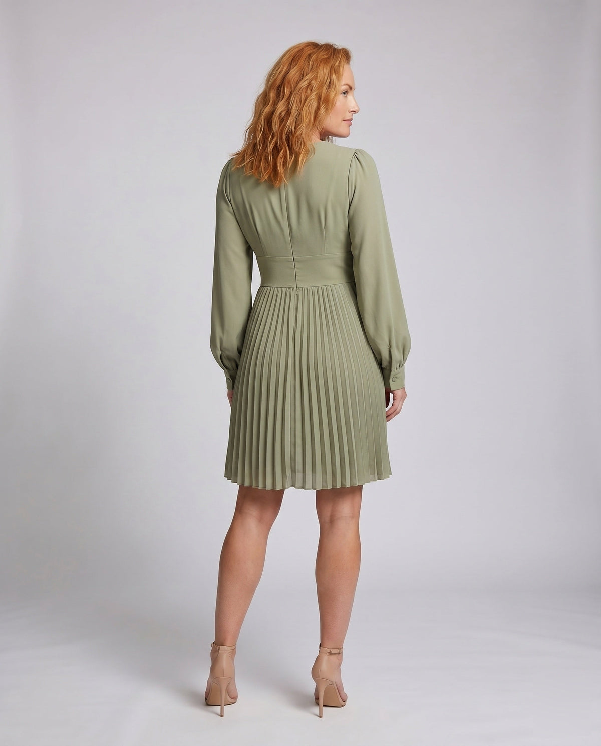 Women's pleated dress with deep V-neck and long sleeves - back view