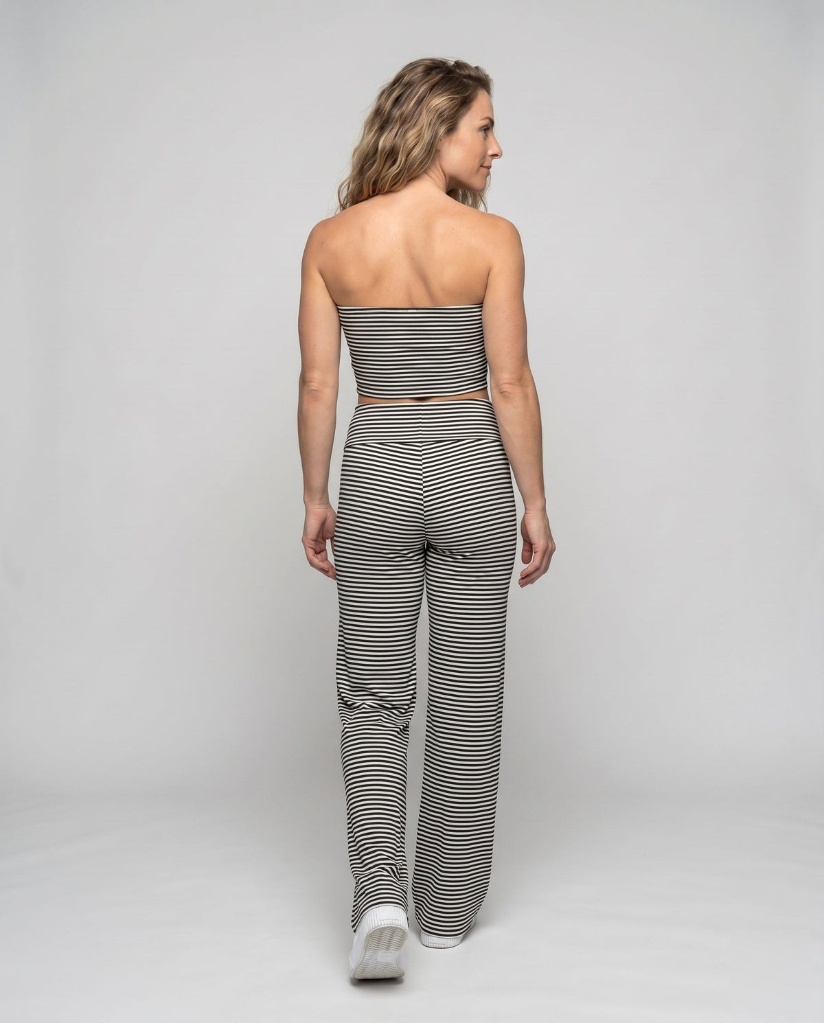 Women two-piece set with narrow top and wide-cut pants - back view