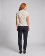 Women's blouse shirt with decorative bow design and fine ruffle details - back view