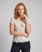 Women's blouse shirt with decorative bow design and fine ruffle details - upper body view