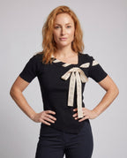 Ladies blouse shirt with decorative tie option design and elegant lace hem - upper body view