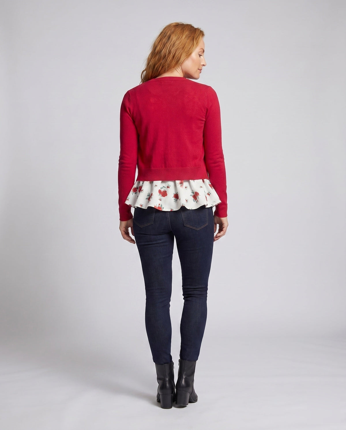 Women's blouse shirt with floral peplum design and charming ruffle accents - back view