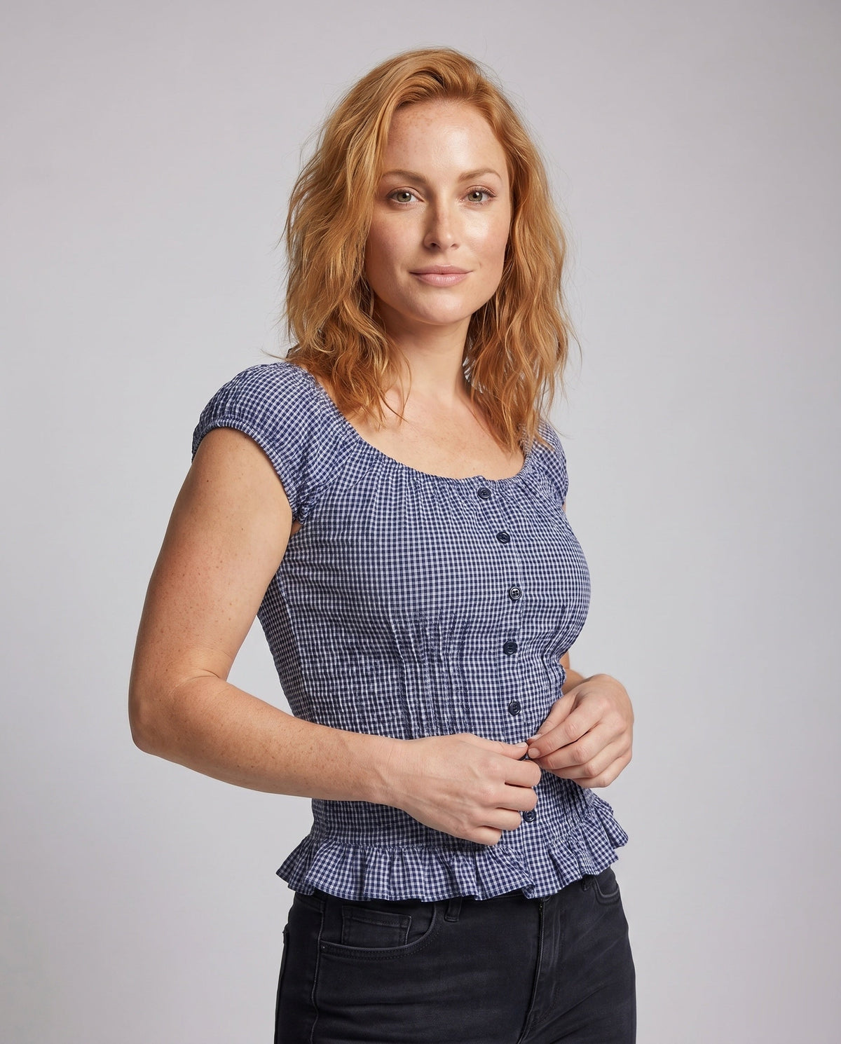 Women's blouse shirt with puff sleeves and decorative buttons - upper body view