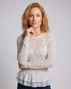 Women’s blouse shirt with playful ruffle design and floral lace - upper body view