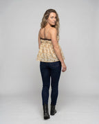 Women’s blouse top with floral accents and adjustable straps - back view