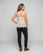 Women’s blouse top with voluminous cut and delicate floral details - back view