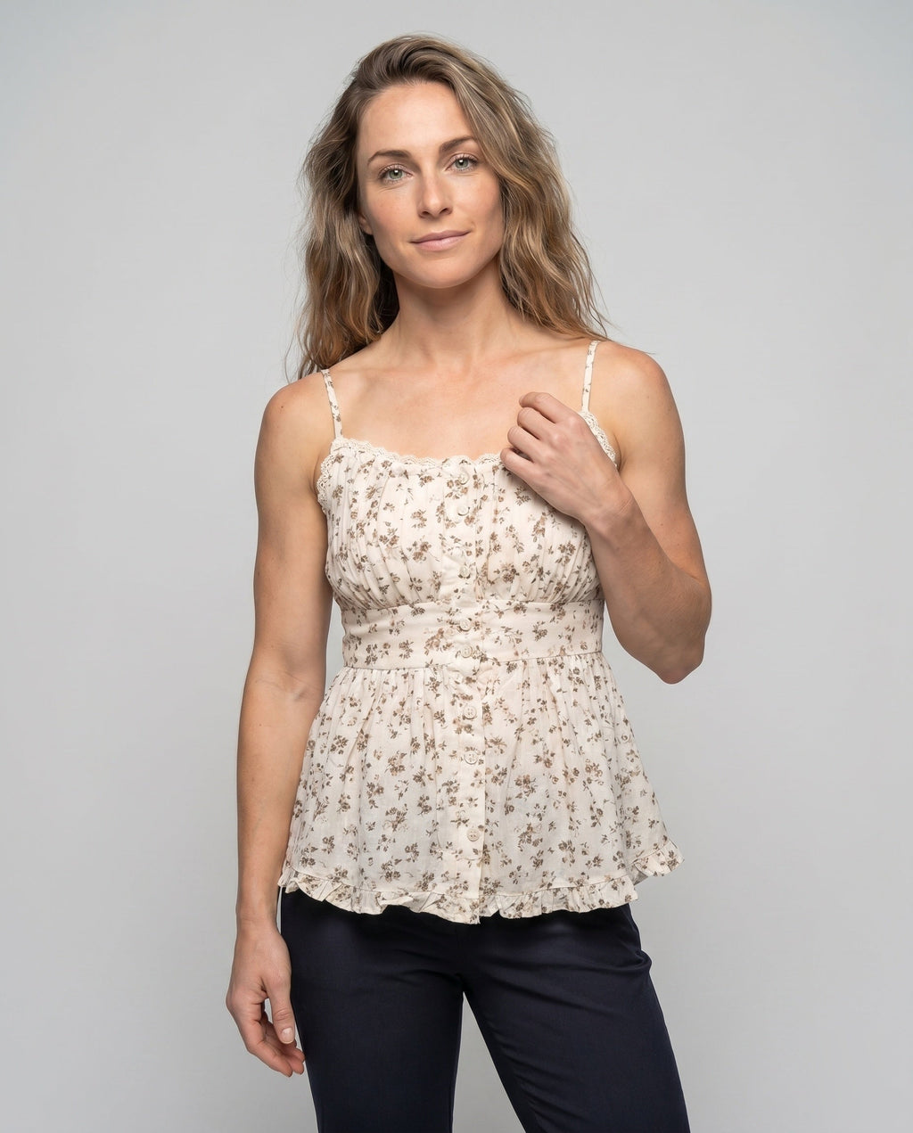 Women’s blouse top with voluminous cut and delicate floral details - upper body view