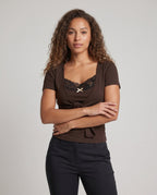 Ladies dress with elegant wrap design and lace - upper body view