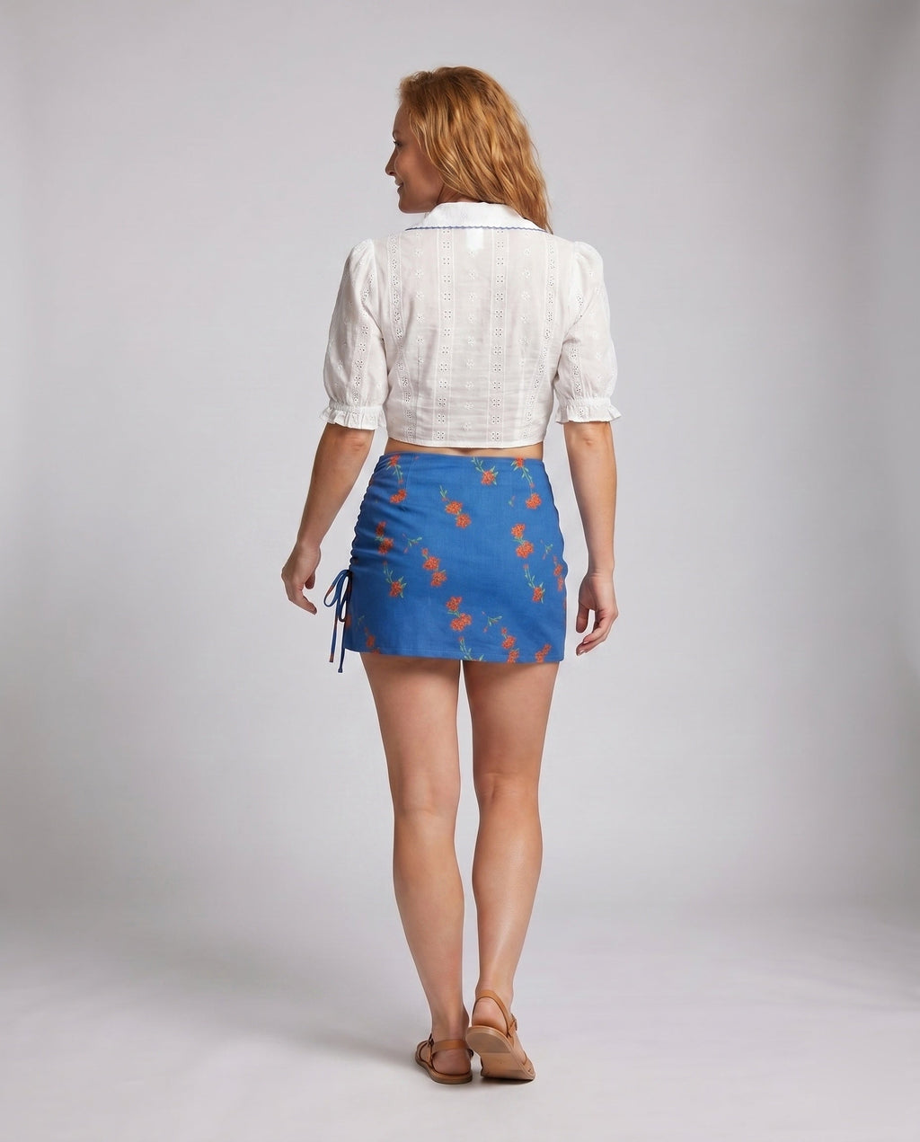 Women's Short Blouse Top with Playful Tie Design - back view