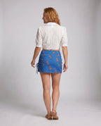 Women's Short Blouse Top with Playful Tie Design - back view