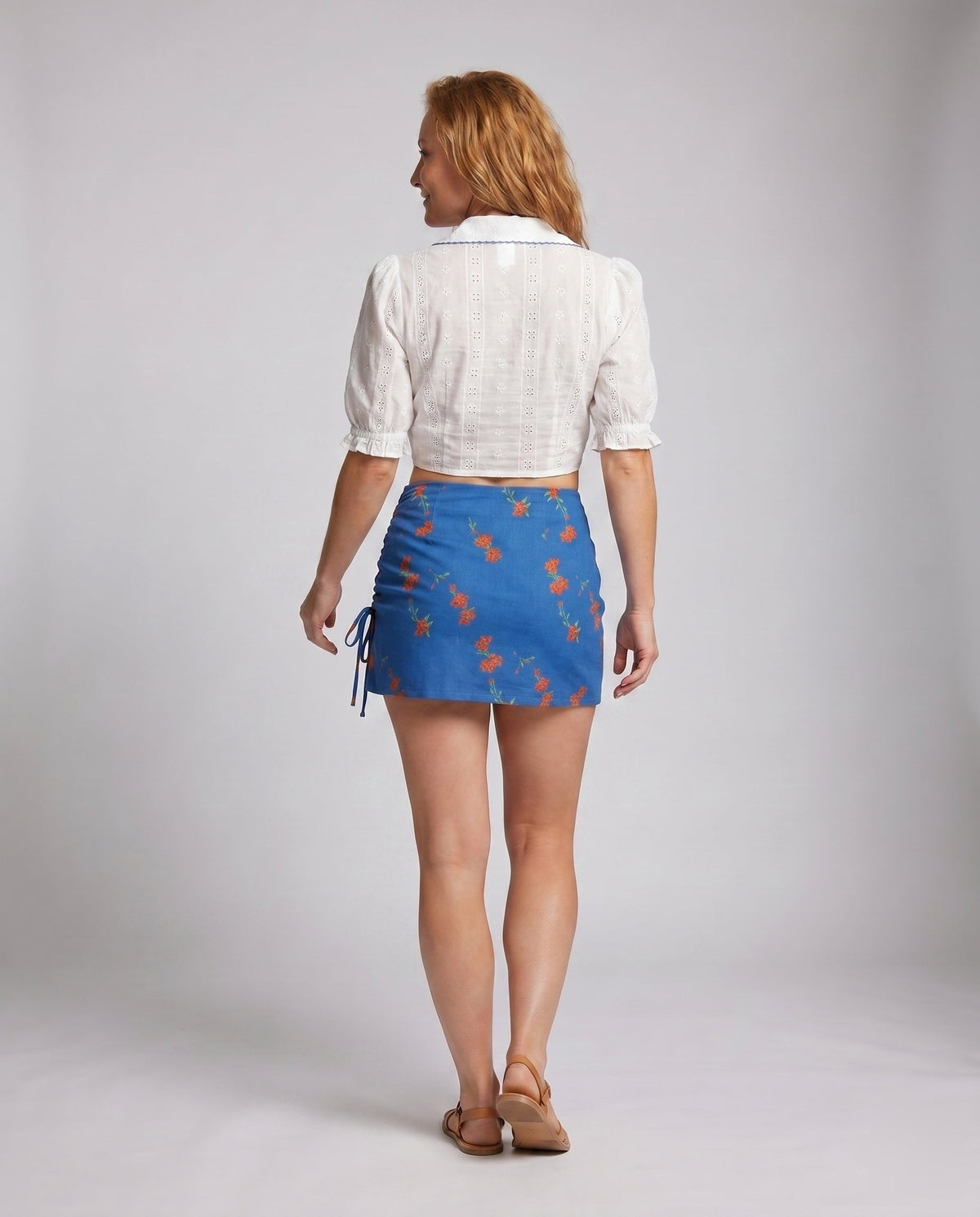 Women's Short Blouse Top with Playful Tie Design - back view