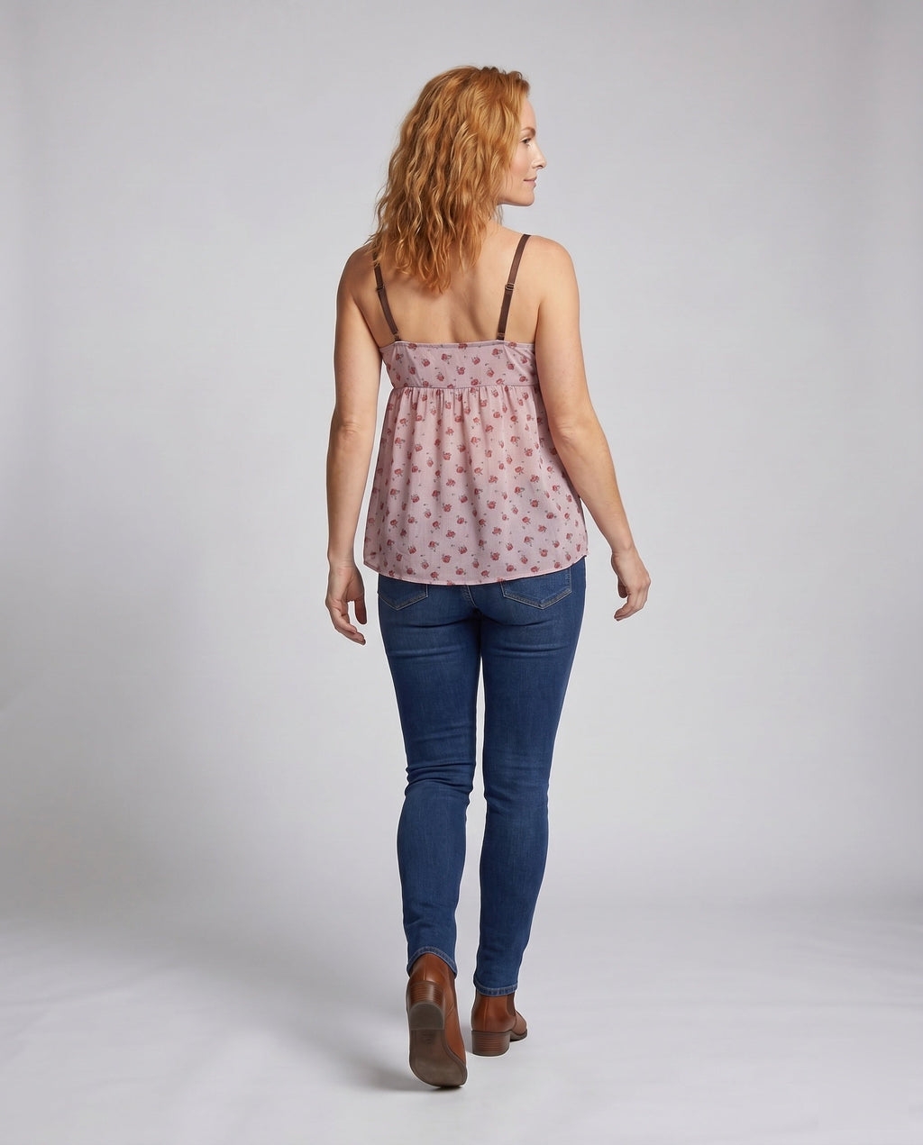 Women casual blouse top with floral patterns and delicate ruffle details - back view