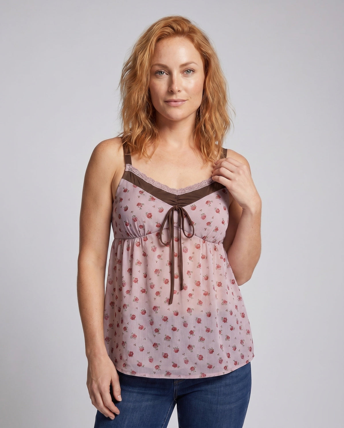 Women casual blouse top with floral patterns and delicate ruffle details - upper body view