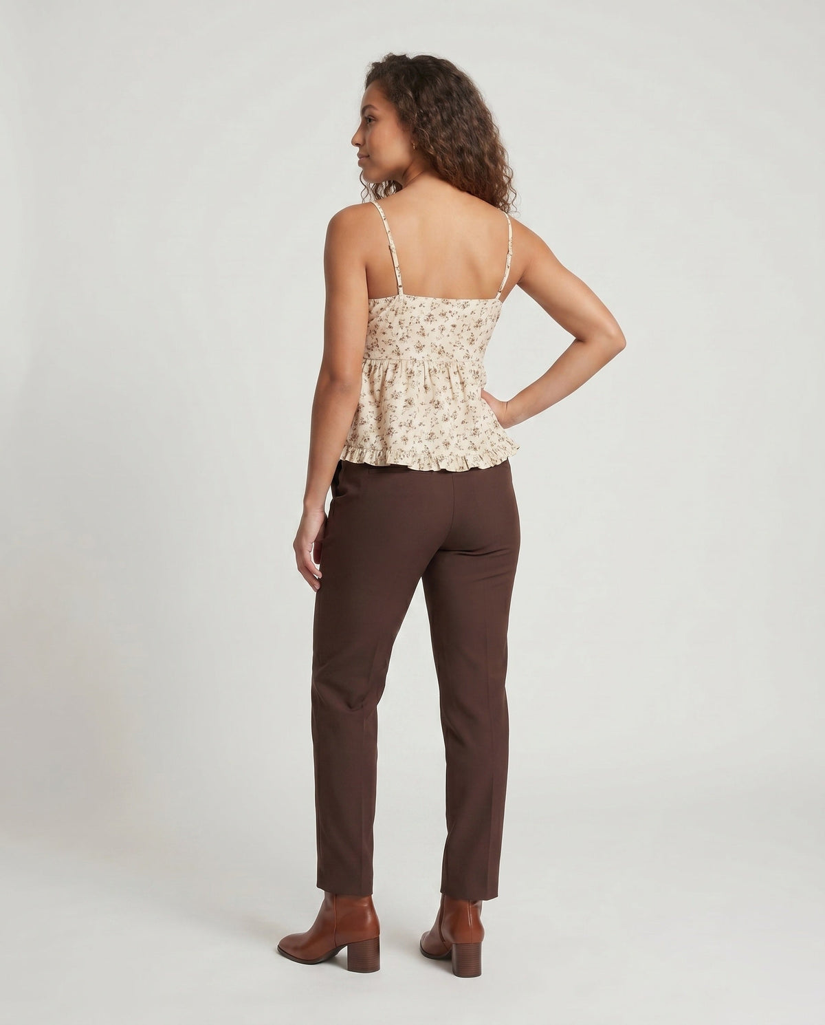 Women’s summer blouse top with floral patterns and ruffles - back view