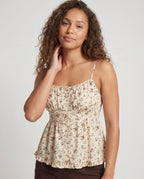 Women’s summer blouse top with floral patterns and ruffles - upper body view