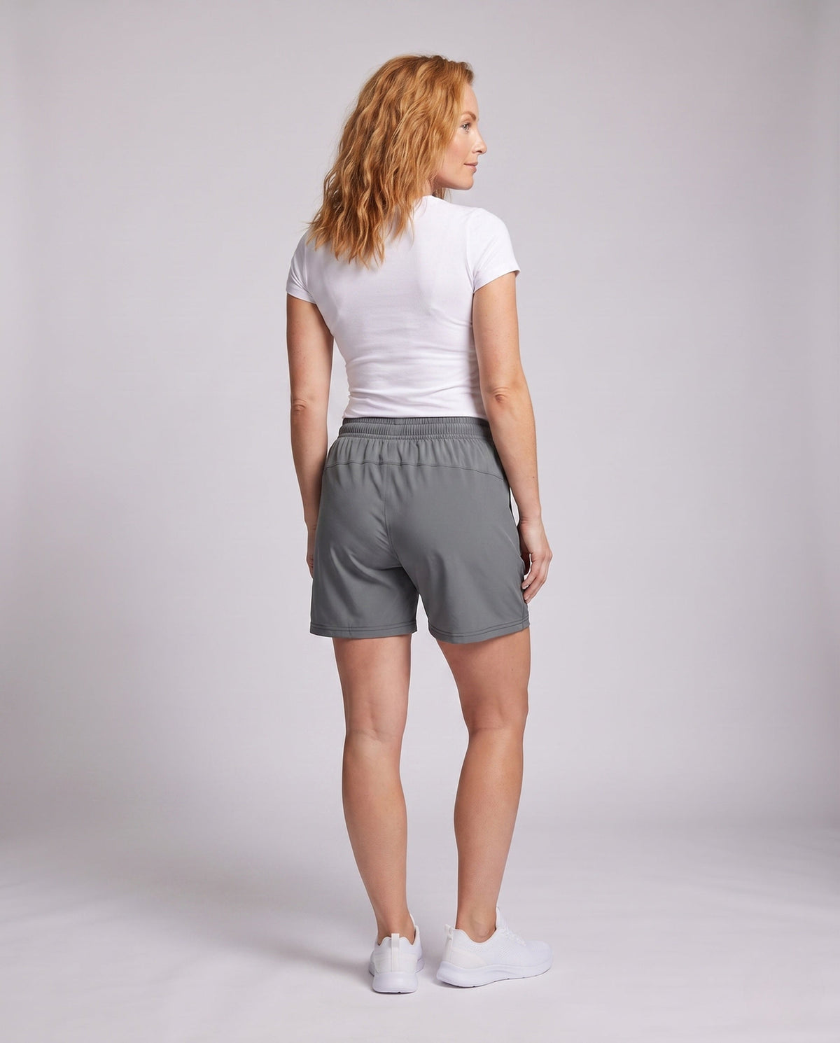 Women's lightweight sports shorts with zip pockets - back view